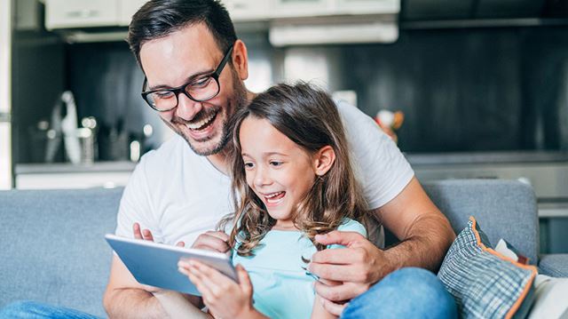 25 free things; man and daughter on tablet